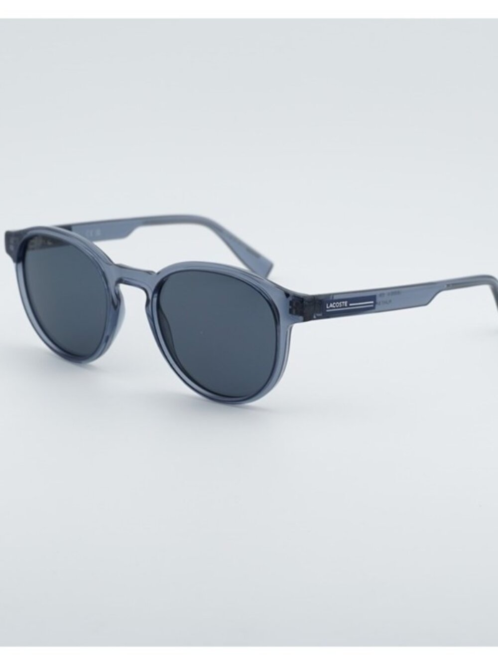 Lacoste L6055S N 038 Sunglasses Grey Round Frame, Grey Lenses